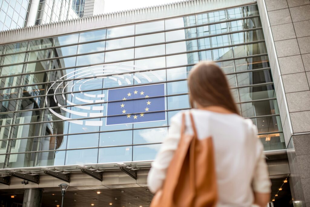 Businesswoman near the parliament building in Brussel